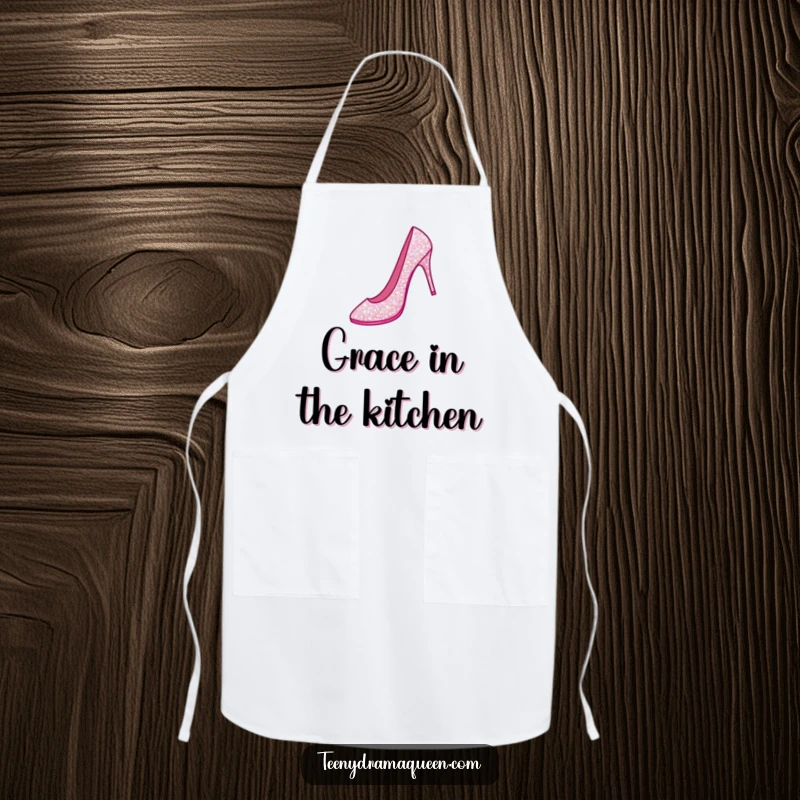 Funny apron featuring a sparkly stiletto shoe performing a grand jeté, perfect for elegant and humorous cooking.
