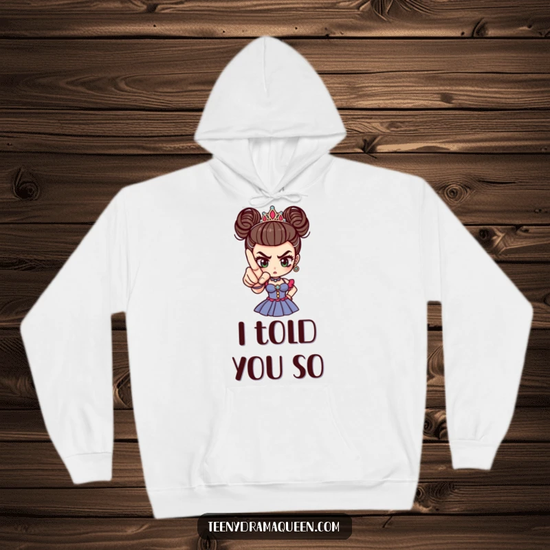 Funny tiny drama queen with perfectly manicured finger pointing accusingly, embodying dramatic sass and cozy comfort.