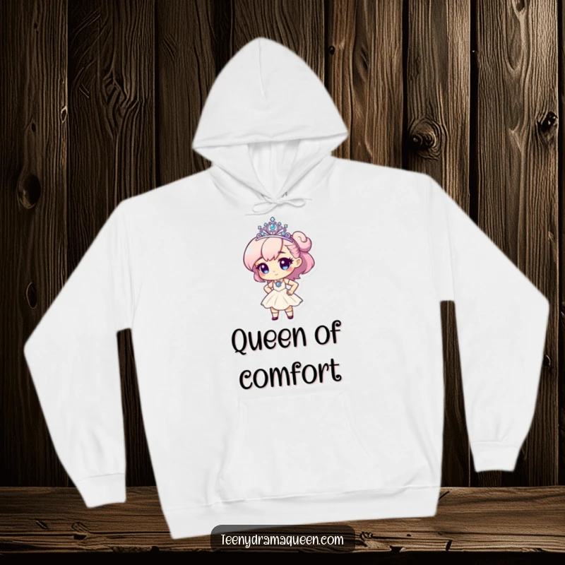 Funny hoodie featuring a tiny character wearing a tiara, striking a dramatic pose, offering cozy glamour.
