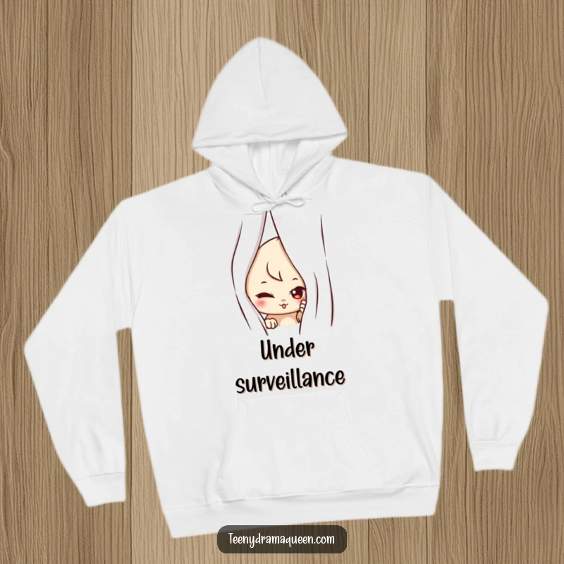 Funny hoodie showcasing a mischievous character playfully peeking from behind a curtain, adding a touch of intrigue and fun.
